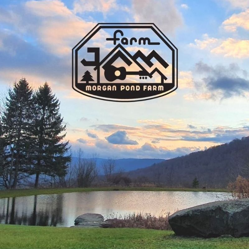 Farm Jam logo over a pond and mountain landscape